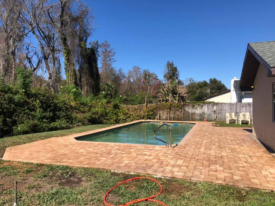 Clean and sealed paver pool deck after paver sealing services in Orlando, FL.